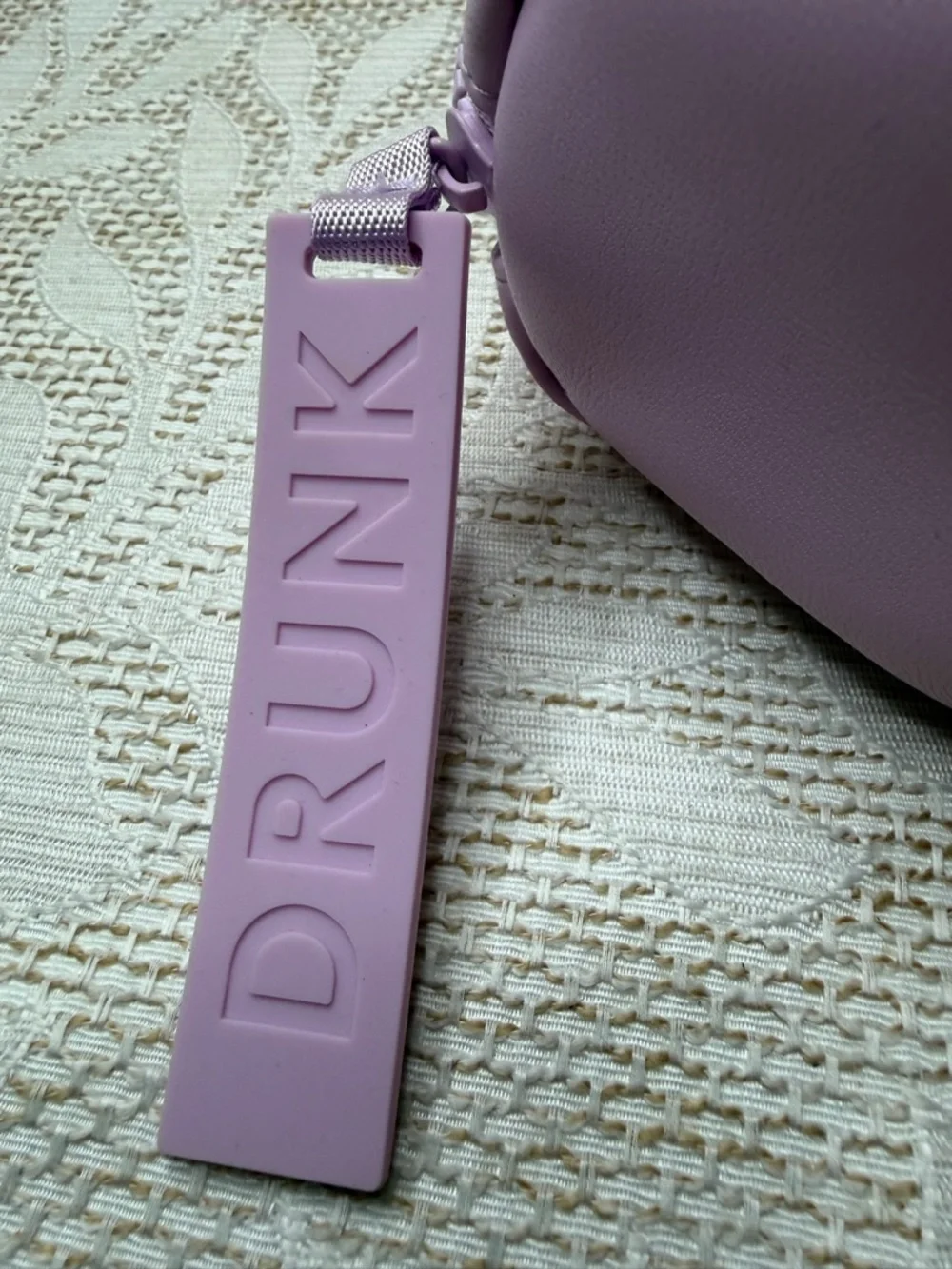 Drunk Elephant purple Lavender puffer pouch. Makeup Travel Bag